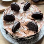 A no-bake Oreo cheesecake, perfectly set with a creamy filling and an Oreo cookie crust, ready to be served and enjoyed