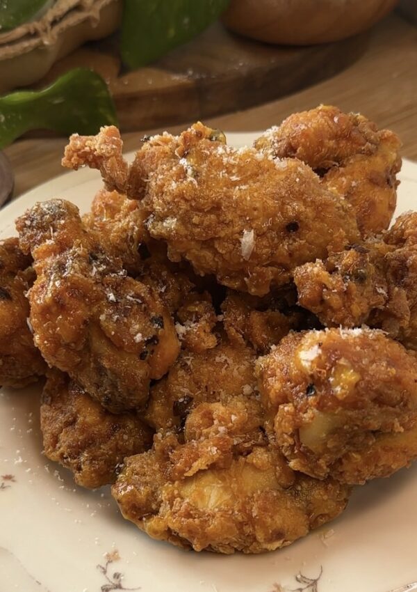 Fully cooked garlic Parmesan chicken wings, crispy and golden, coated in a rich, garlic Parmesan butter